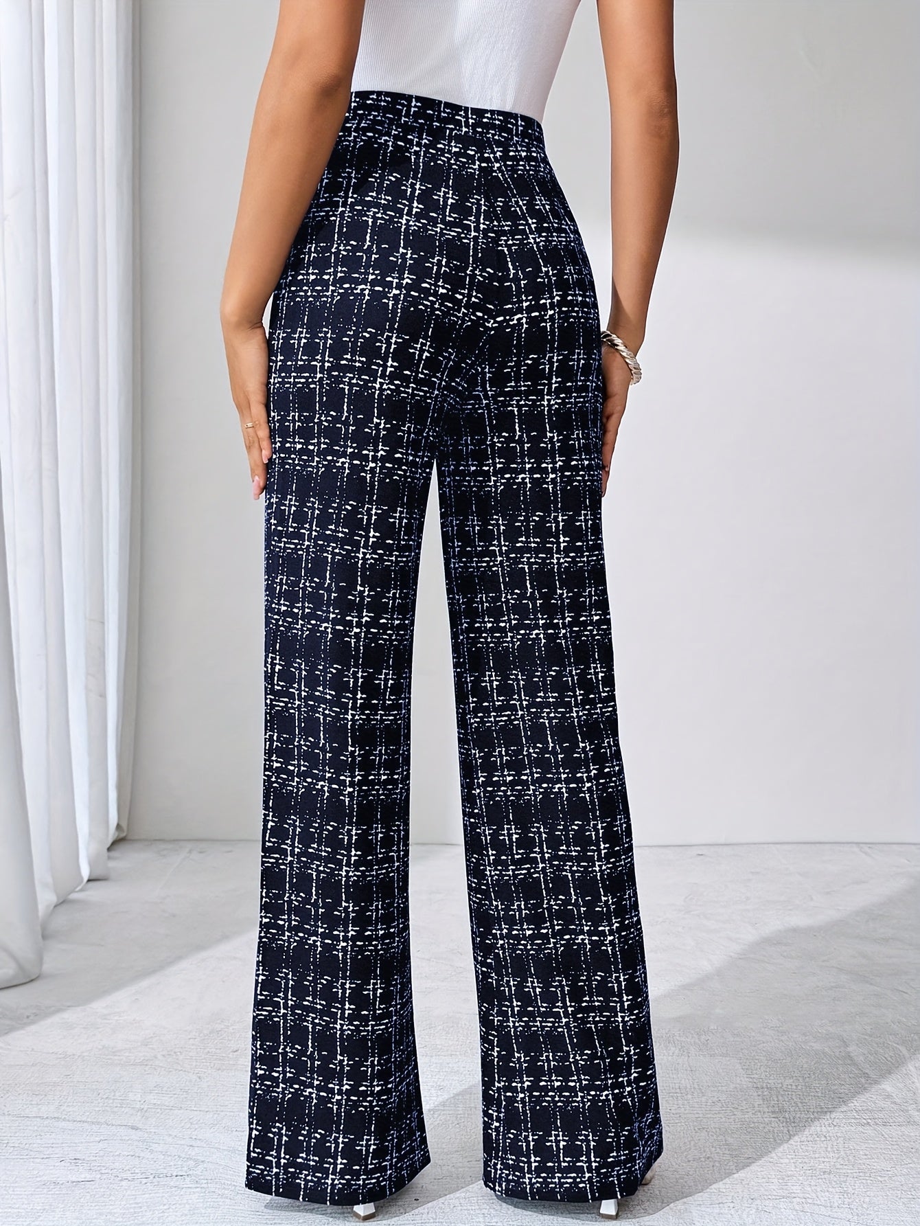 Geruite™ | Vrouwen Zwart-witte Geruite Flared Broek
