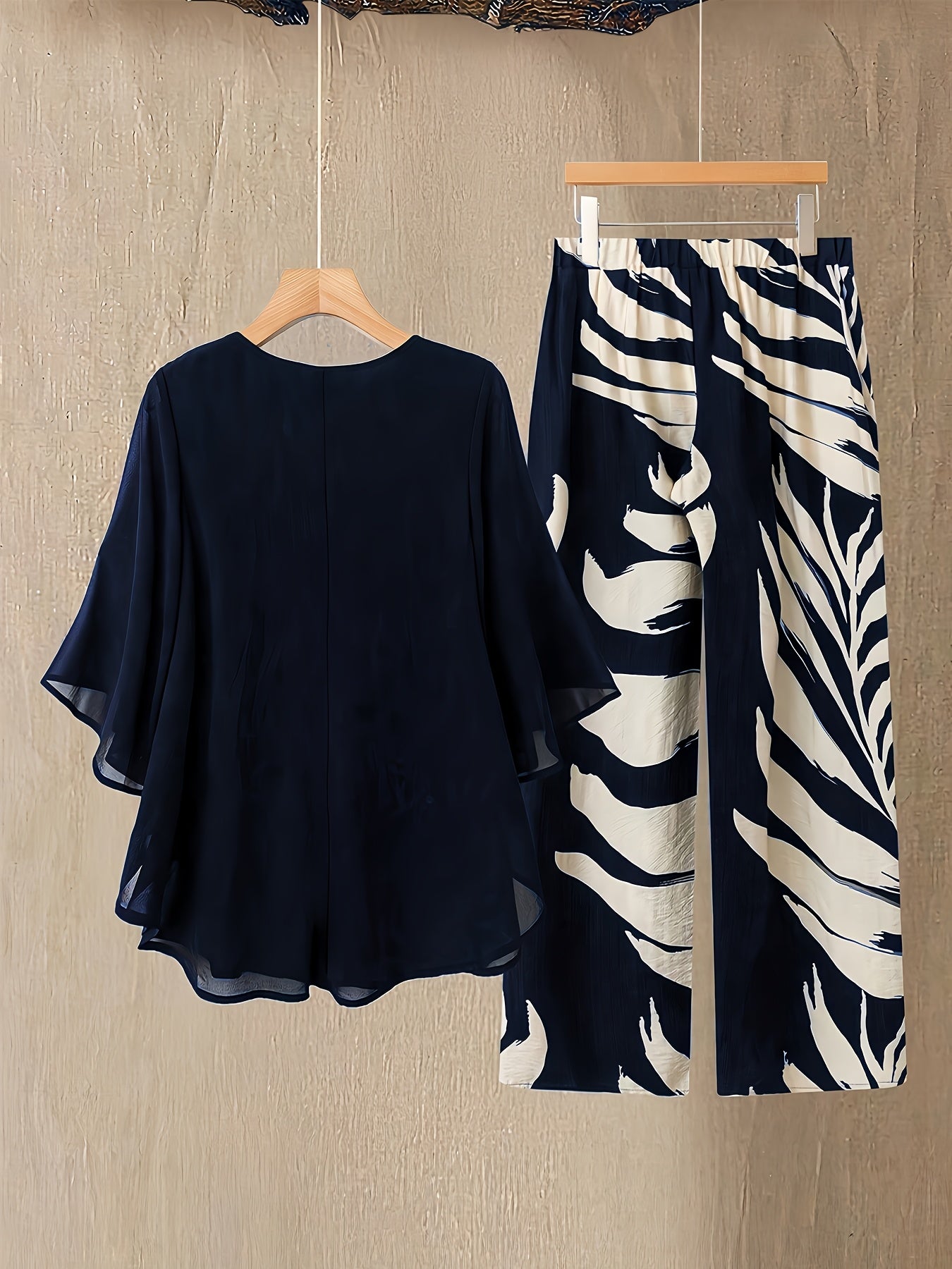 Broek™ | Elegante Bloemenprint Broek En Mouwloze Blouse Set Voor Vrouwen