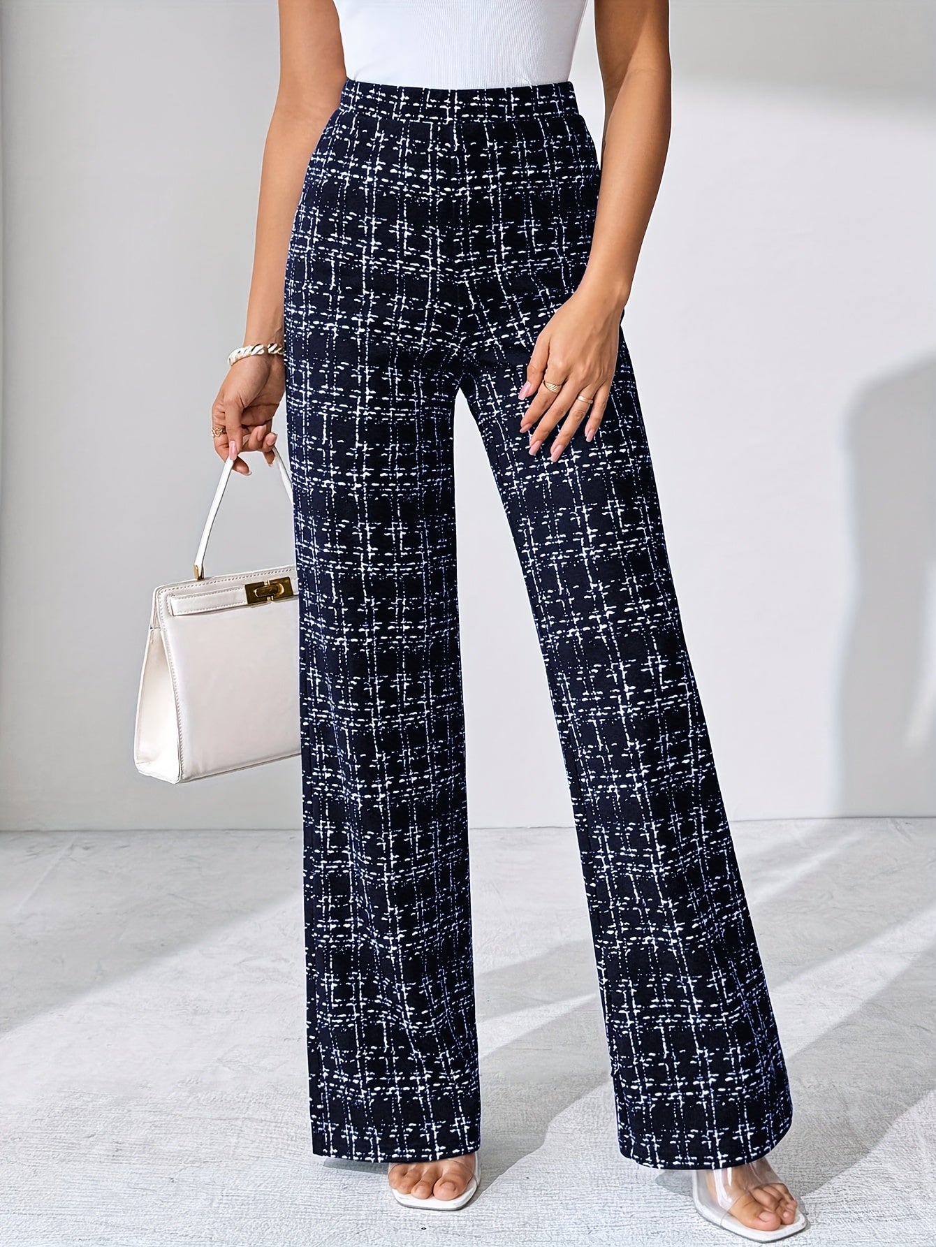 Geruite™ | Vrouwen Zwart-witte Geruite Flared Broek