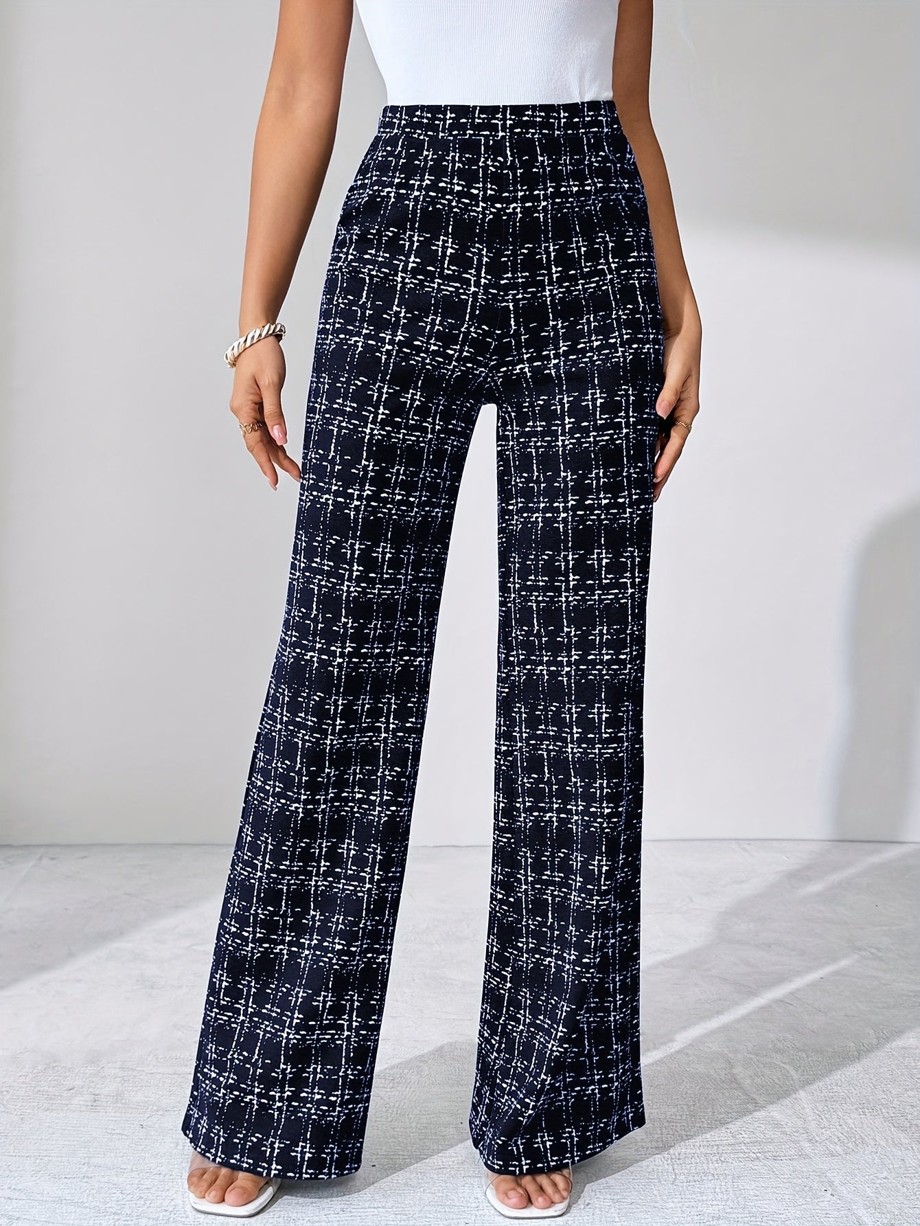 Geruite™ | Vrouwen Zwart-witte Geruite Flared Broek
